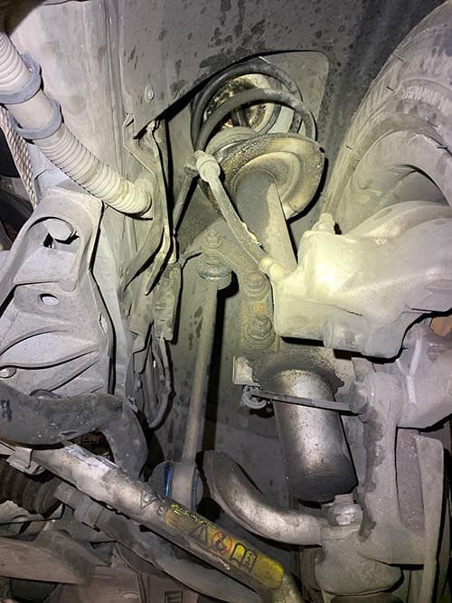 blown strut on BMW, suspension is failing